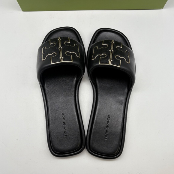 Step into style ✨ Discover the Tory Burch Double T Sport  TORY BURCH Double T Sort Slide sandal Bk/Gold